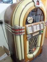 People recommend "Holy Grail of all Jukeboxes 1946 Wurlitzer 1015 Bubbler"