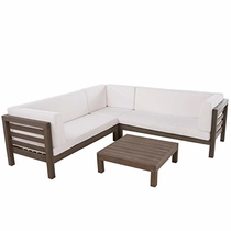 People recommend "GDF Studio Ravello Outdoor 5 Seater V Shaped Mid-Century Modern Acacia Wood Sectional Sofa Set with Coffee Table, Gray and White"