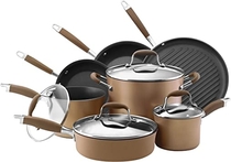 People recommend "Anolon Advanced Nonstick Cookware Pots and Pans Set, 11-Piece, Bronze"